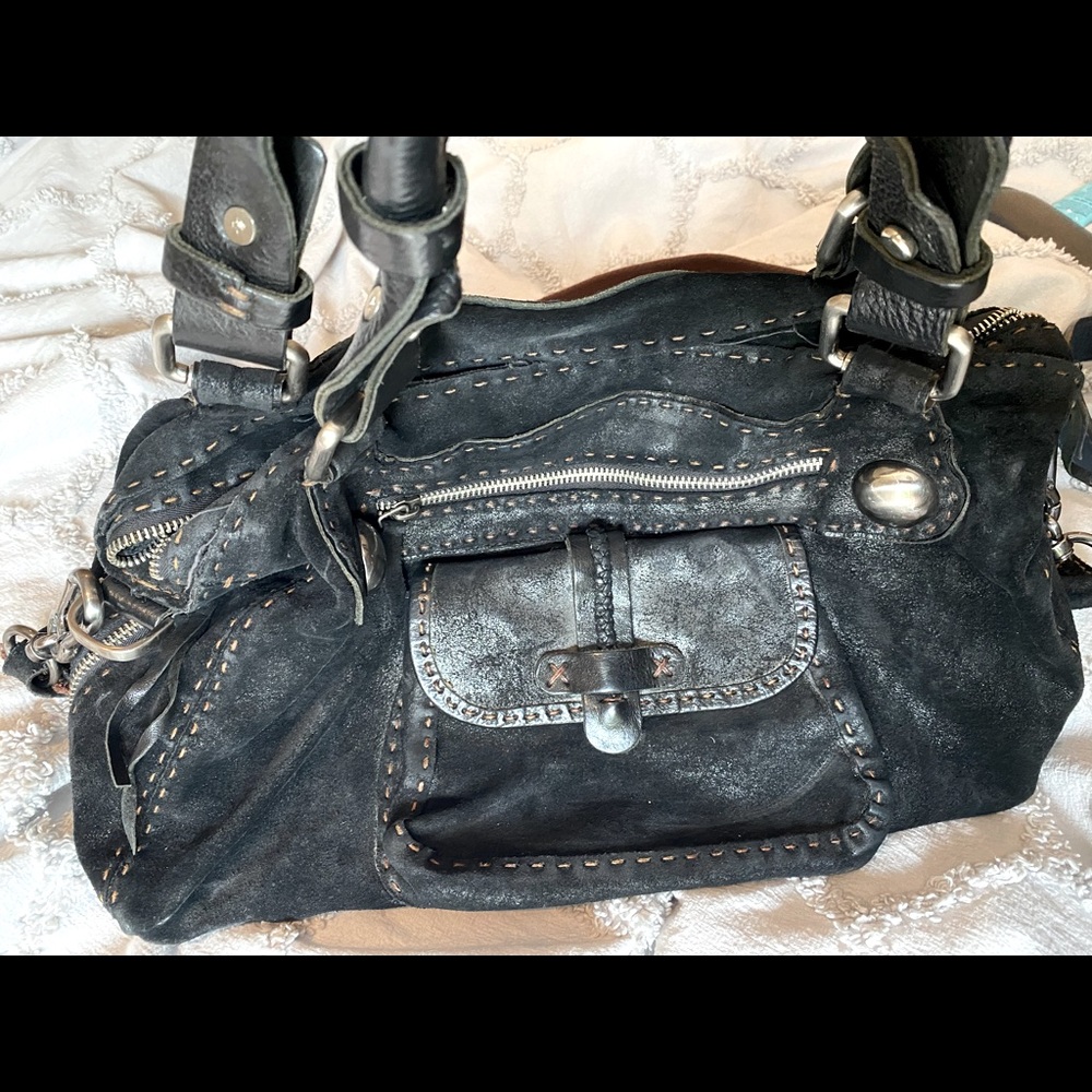 Beautiful leather suede black designer purse .